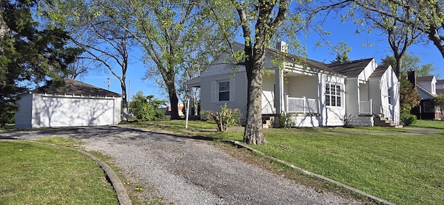 259 W End Hts, Lebanon, TN 37087 - view of side of property featuring a garage, an outdoor structure, stucco siding, and a yard