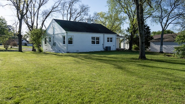 259 W End Hts, Lebanon, TN 37087 - rear view of property featuring a chimney, a yard, and central AC
