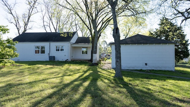 259 W End Hts, Lebanon, TN 37087 - back of property with a shingled roof, central air condition unit, and a yard