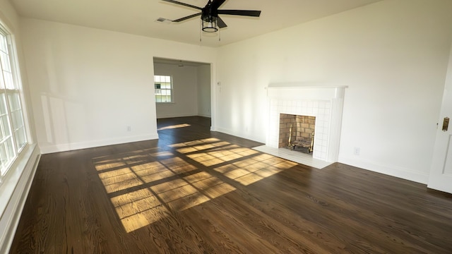 259 W End Hts, Lebanon, TN 37087 - unfurnished living room with visible vents, wood finished floors, baseboards, ceiling fan, and a tiled fireplace