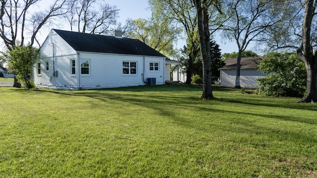259 W End Hts, Lebanon, TN 37087 - back of property with crawl space, central AC, a yard, and a chimney