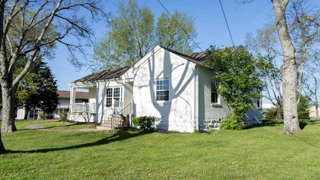 259 W End Hts, Lebanon, TN 37087 - back of house featuring a lawn and brick siding