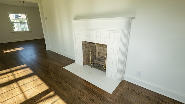 259 W End Hts, Lebanon, TN 37087 - unfurnished living room with baseboards, wood finished floors, and a tile fireplace