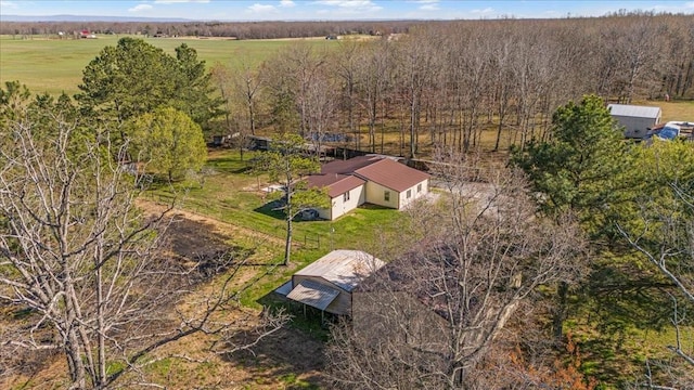 birds eye view of property with a rural view