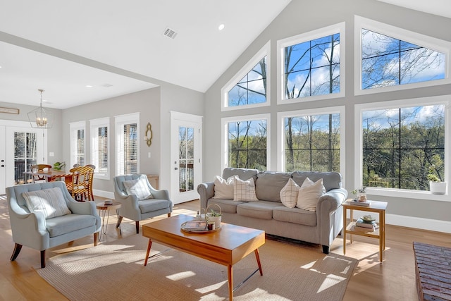 1017 Cliff View Dr N, Kingston Springs, TN 37082 - sunroom with an inviting chandelier and visible vents
