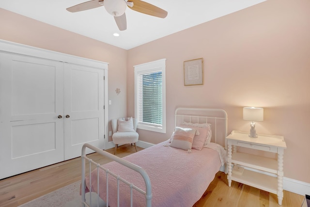 1017 Cliff View Dr N, Kingston Springs, TN 37082 - bedroom featuring a closet, baseboards, recessed lighting, a ceiling fan, and wood finished floors