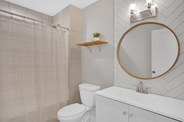 1017 Cliff View Dr N, Kingston Springs, TN 37082 - bathroom featuring toilet, decorative backsplash, and vanity