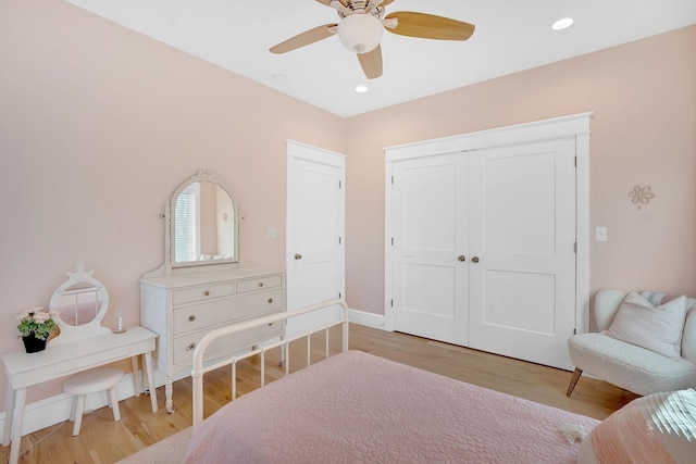1017 Cliff View Dr N, Kingston Springs, TN 37082 - bedroom featuring a closet, baseboards, recessed lighting, ceiling fan, and light wood finished floors