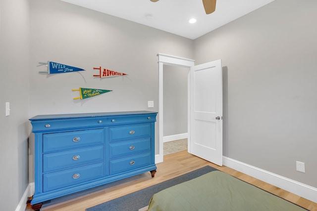 1017 Cliff View Dr N, Kingston Springs, TN 37082 - bedroom with light wood-type flooring, baseboards, and a ceiling fan