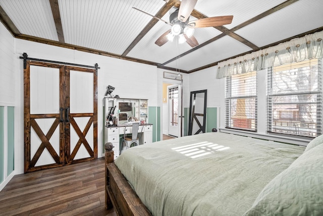bedroom featuring a barn door, dark wood-type flooring, and beamed ceiling