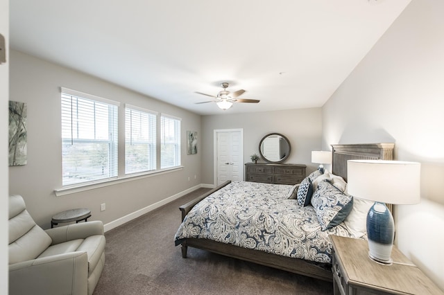 carpeted bedroom with baseboards and a ceiling fan