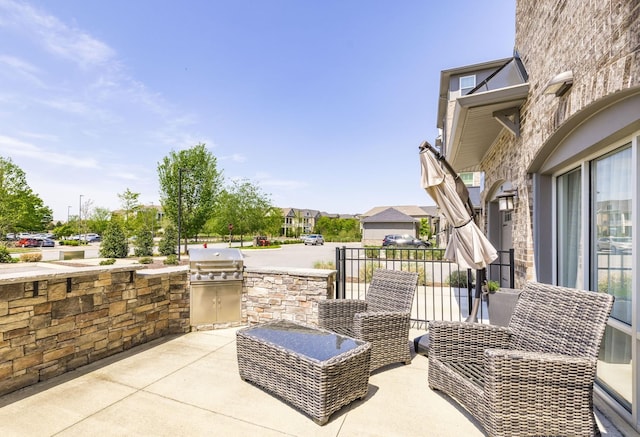 view of patio / terrace with grilling area and exterior kitchen