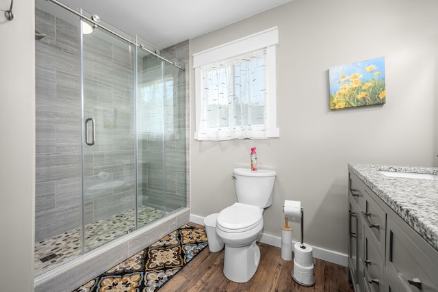 1036 Locke Creek Rd, Readyville, TN 37149 - full bath featuring toilet, vanity, a shower stall, wood finished floors, and baseboards