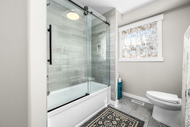 1036 Locke Creek Rd, Readyville, TN 37149 - bathroom featuring visible vents, baseboards, marble finish floor, toilet, and enclosed tub / shower combo