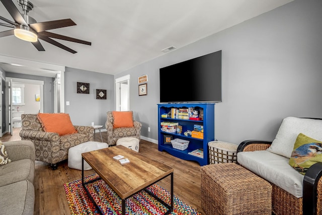 1036 Locke Creek Rd, Readyville, TN 37149 - living room with baseboards, visible vents, wood finished floors, and a ceiling fan