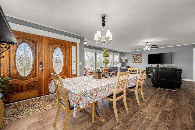 1036 Locke Creek Rd, Readyville, TN 37149 - dining room with ceiling fan with notable chandelier and dark wood-style floors