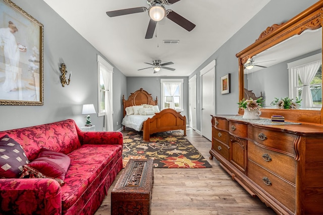 1036 Locke Creek Rd, Readyville, TN 37149 - bedroom featuring multiple windows, visible vents, ceiling fan, and light wood-type flooring
