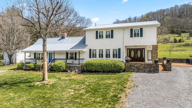 1036 Locke Creek Rd, Readyville, TN 37149 - view of front of home with metal roof, a chimney, a porch, and a front yard