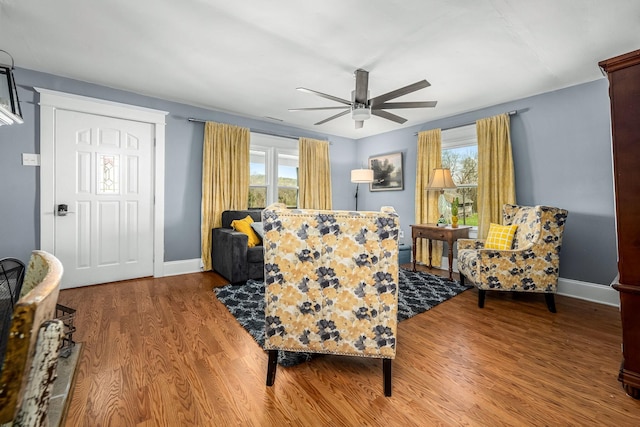 1036 Locke Creek Rd, Readyville, TN 37149 - living area featuring a healthy amount of sunlight, wood finished floors, baseboards, and a ceiling fan