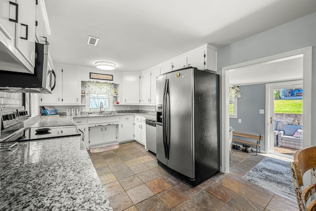 1036 Locke Creek Rd, Readyville, TN 37149 - kitchen with a sink, visible vents, stainless steel appliances, and plenty of natural light