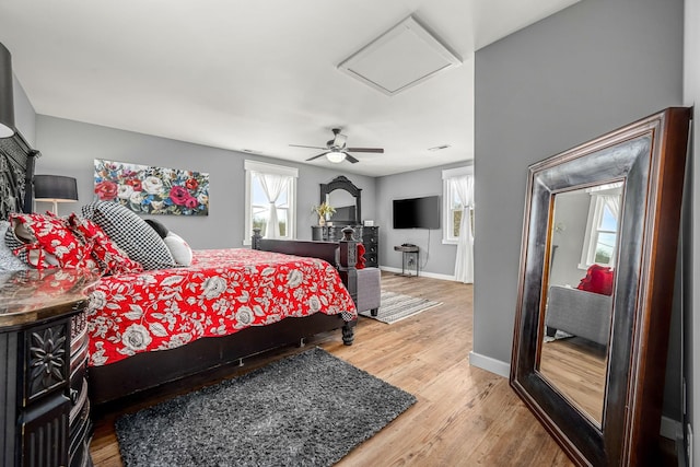 1036 Locke Creek Rd, Readyville, TN 37149 - bedroom featuring baseboards, a ceiling fan, wood finished floors, and attic access