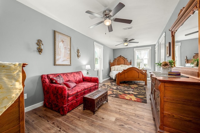 1036 Locke Creek Rd, Readyville, TN 37149 - bedroom with light wood finished floors, baseboards, and visible vents