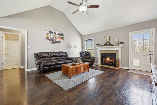 3648 S Jot Dr, Clarksville, TN 37040 - living area featuring wood-type flooring, high vaulted ceiling, baseboards, ceiling fan, and a tiled fireplace