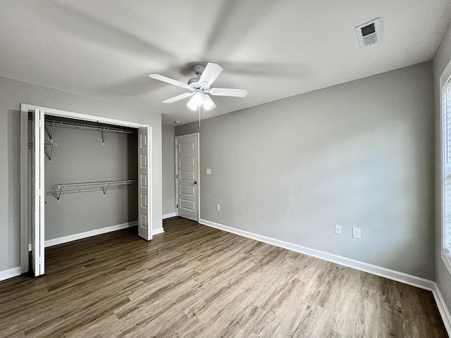 402 Pine St, Pulaski, TN 38478 - unfurnished bedroom featuring wood finished floors, baseboards, a closet, and ceiling fan