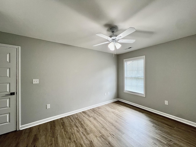 402 Pine St, Pulaski, TN 38478 - unfurnished room with ceiling fan, wood finished floors, and baseboards