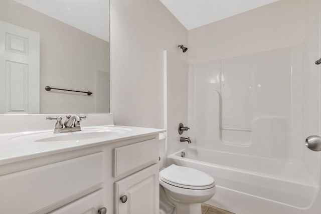 full bathroom featuring toilet, vanity, and shower / washtub combination