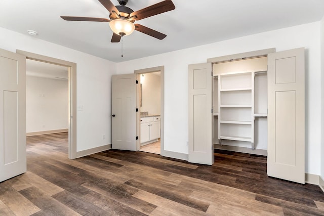 12 Lonsvale Dr, Mcminnville, TN 37110 - unfurnished bedroom featuring a walk in closet, wood finished floors, baseboards, a closet, and ensuite bathroom