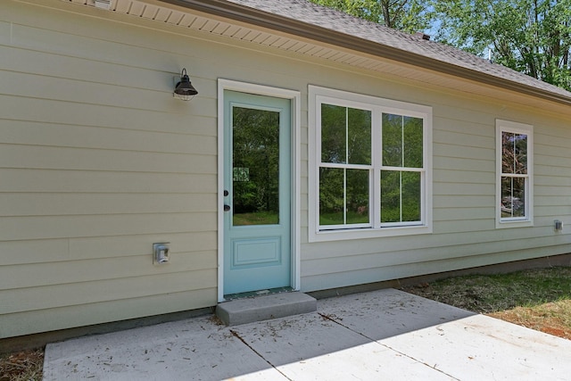 12 Lonsvale Dr, Mcminnville, TN 37110 - entrance to property with a patio area and roof with shingles