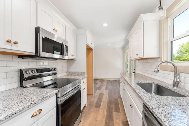 12 Lonsvale Dr, Mcminnville, TN 37110 - kitchen featuring recessed lighting, white cabinets, a sink, dark wood finished floors, and stainless steel appliances