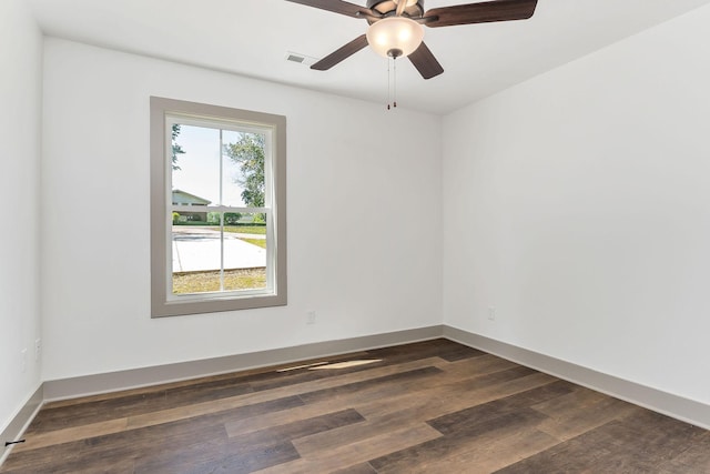 12 Lonsvale Dr, Mcminnville, TN 37110 - unfurnished room featuring baseboards, a ceiling fan, dark wood-style floors, and visible vents
