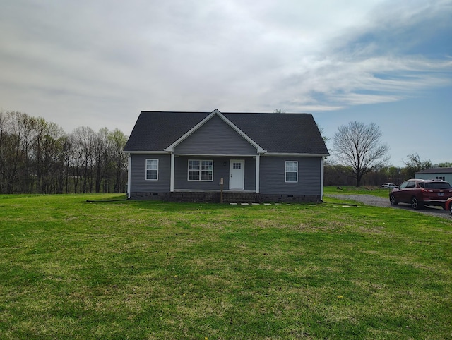 view of front of home featuring a front lawn and crawl space