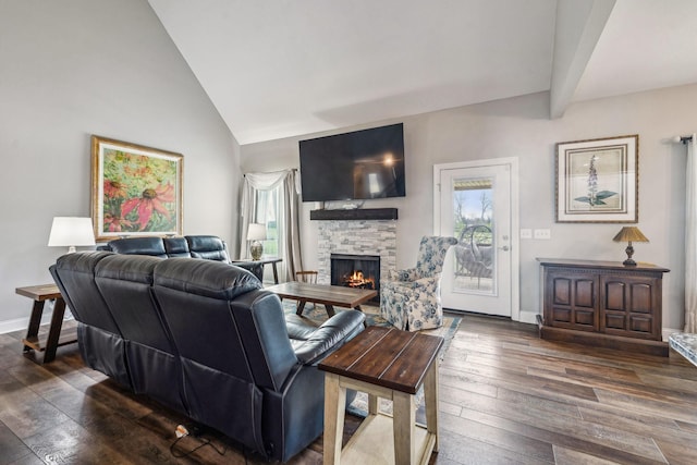 120 Sideview Rd, Gallatin, TN 37066 - living room with lofted ceiling with beams, dark wood-style floors, baseboards, and a stone fireplace