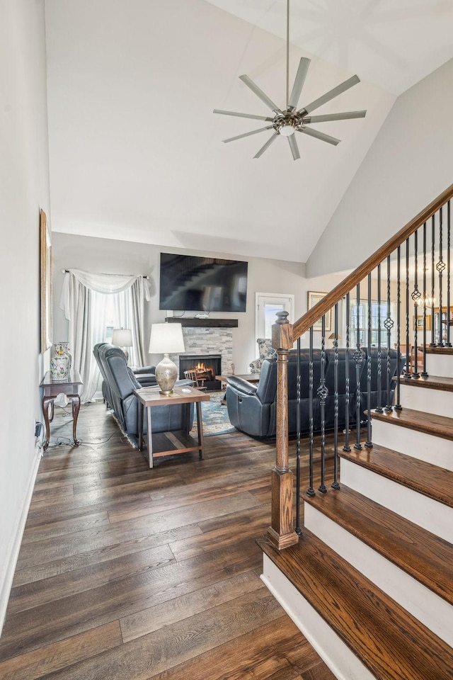 120 Sideview Rd, Gallatin, TN 37066 - living room with stairs, vaulted ceiling, a ceiling fan, a fireplace, and wood finished floors