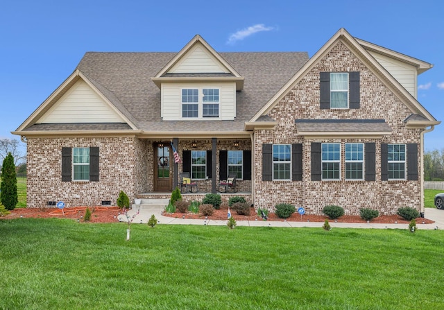 120 Sideview Rd, Gallatin, TN 37066 - craftsman house featuring a shingled roof, a front lawn, covered porch, and brick siding