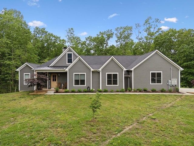 6033 Vesper Way E, Franklin, TN 37064 - view of front facade with a porch, a front yard, and a chimney