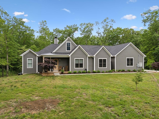 6033 Vesper Way E, Franklin, TN 37064 - view of front of home with a porch, a chimney, and a front yard