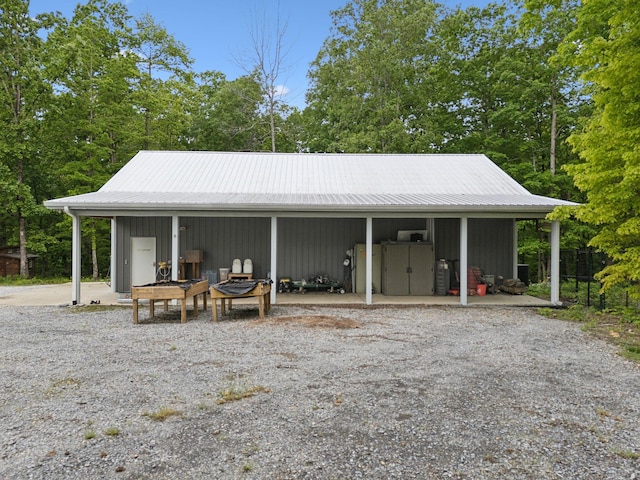 6033 Vesper Way E, Franklin, TN 37064 - view of outdoor structure featuring view of wooded area