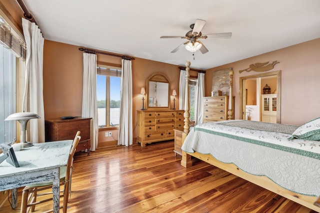 bedroom featuring wood finished floors and ceiling fan