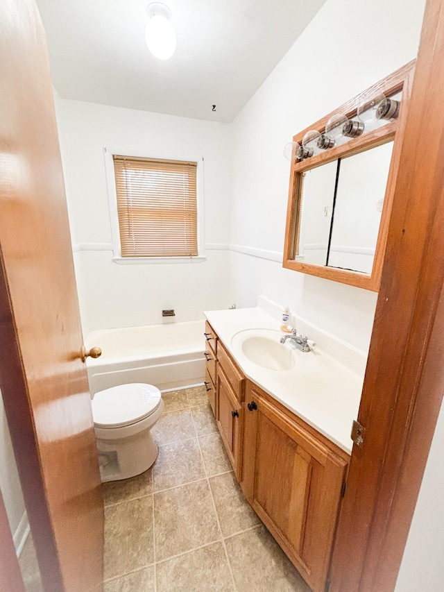 126 Zimmerman St, Hohenwald, TN 38462 - full bathroom with toilet, tile patterned floors, vanity, and a bathing tub