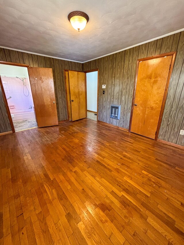 126 Zimmerman St, Hohenwald, TN 38462 - interior space featuring a fireplace, crown molding, and wood-type flooring
