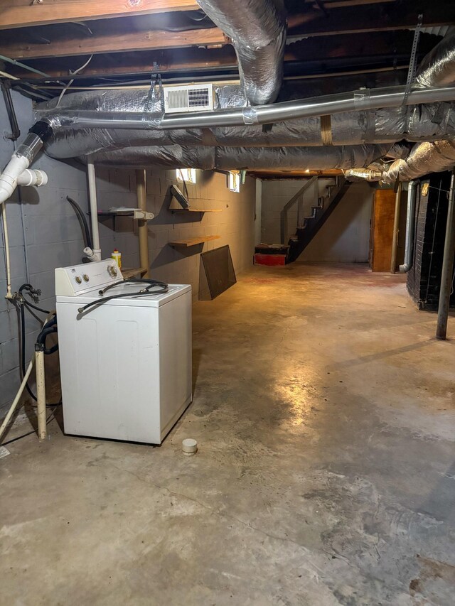 126 Zimmerman St, Hohenwald, TN 38462 - unfinished basement featuring visible vents, stairway, and washer / dryer