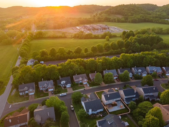 aerial view at dusk with a residential view