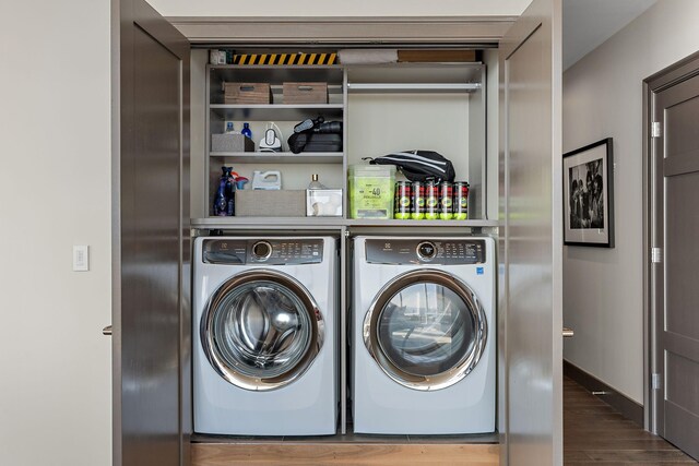 515 Church St Unit 3908, Nashville, TN 37219 - laundry area with washer and dryer and wood finished floors