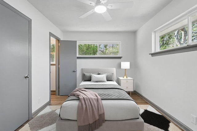 821 S Germantown Rd, Chattanooga, TN 37412 - bedroom featuring wood finished floors, baseboards, and ceiling fan