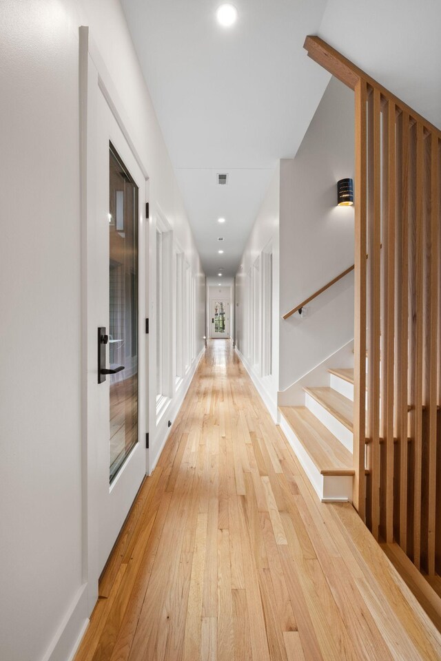 1122 Oman Dr, Brentwood, TN 37027 - hallway featuring light wood finished floors, stairway, and recessed lighting