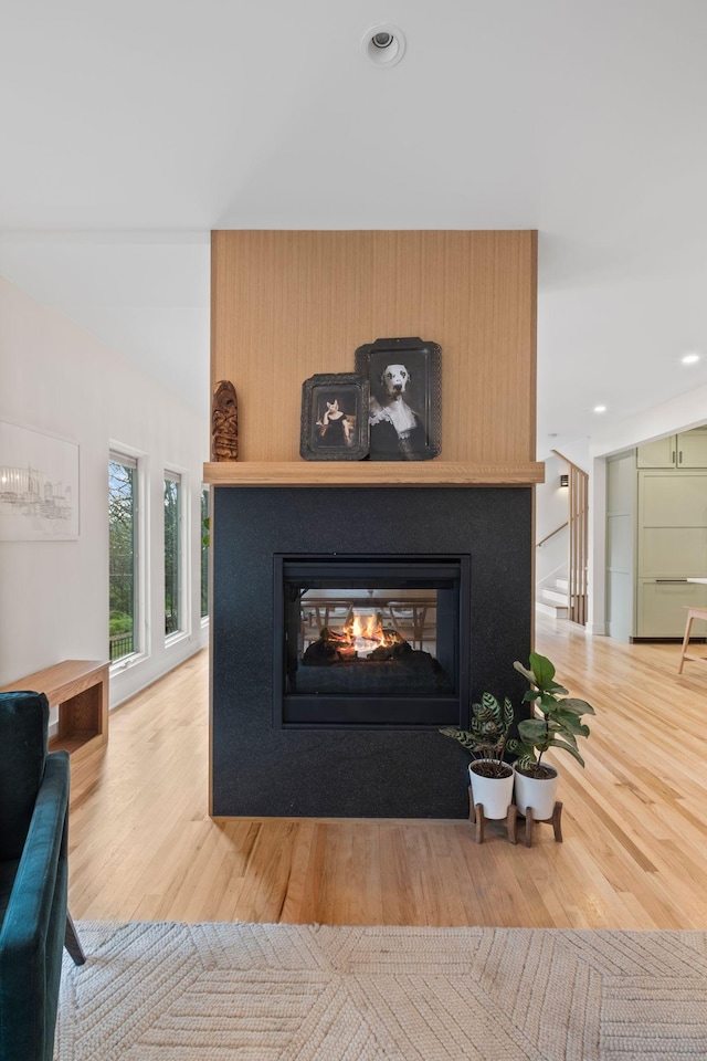 1122 Oman Dr, Brentwood, TN 37027 - detailed view of wood finished floors, a multi sided fireplace, and recessed lighting